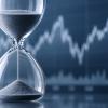 hourglass with chart in background